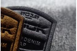 China 3D Snow Suit Micro Fiber Woven Clothing Labels Embossed Patches supplier
