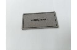 China Microfiber Embossed Logo PU Leather Label Sew On Clothing Customize Design supplier