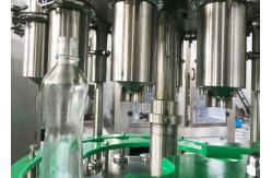 China Automatic Olive Oil Filling Capping Machine 2000BPH Rotary Liquid Filling Machine supplier
