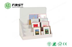 China 4 Tiers Foldable Cardboard Tabletop Display Custom Printing For Books Promotion supplier