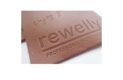 China ODM Embossed Logo Genuine Leather Patches For Clothing And Hats supplier