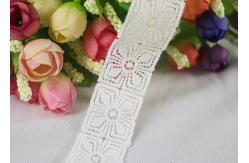 China Chemical Solubility Polyester Lace Trim With Concise Quadrate Flower Design supplier