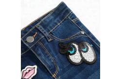 China Slim Fit Style Whisker Baby Girl Jeans Pants With Sequin Patch Design supplier