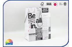 China Custom Print Paper Shopping Bags With Cotton Ropes For Clothes supplier