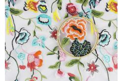 China Beautiful Polyester Flower Embroidered Net Lace Fabric 3d Flower Apparel Fabric supplier