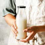 Embossed Logo 32Oz 1 Liter Heat Resistant Milk Delivery Glass Bottles With Cap for sale