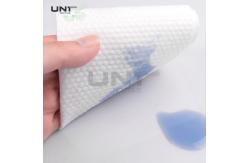 China Pearl Dot Pattern Spunlace Nonwoven Fabric Cross Lapping 10cm Width supplier