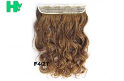 China 22 Inch Gold Clip In Synthetic Curly Hair Extensions With Body Wave supplier