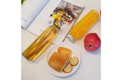 China Transparent Bulk Glass Juice Bottles 2 Oz 300ml for Soft Drink supplier