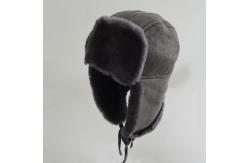 China Trapper Sheepskin Hat Shearling Mens Winter Hats With Ear Flaps supplier