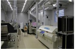 China Smd Soldering Surface Mount Reflow Oven Small 4 Zones 980mm Heating Tunnel supplier