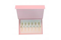China Custom Pink Perfume Essential Oil Bottle Foam Magnetic Paper Boxes with Matt Lamination supplier