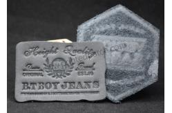 China Small Black Custom Leather Clothing Labels Debossed For Jeans supplier