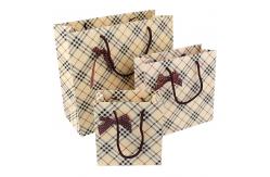 China Custom Printed Biodegradable Paper Carrier Bags Wholesale With Bowknot supplier