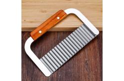 China Wavy Crinkle Cutting Chopping Tools Stainless Steel Potato Slicer With Wooden Handle supplier