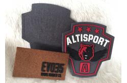 China Fashionalbe Custom 3D Rubber Logo Patches , Injection Sew On T Shirt Patch supplier
