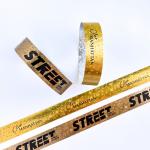 Disposable Golden Star Pattern Logo Text Printed Wristband Unisex Fashionable Holographic Appearance
