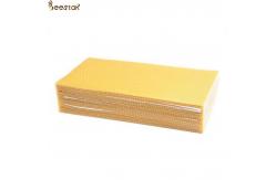 China Customized Cell Size Pure Natural Beeswax Grade D Confectionary Industries supplier