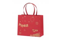 China Printed Coloured Paper Carrier Bags Purse Packaging Rivet Flat Paper Handle supplier