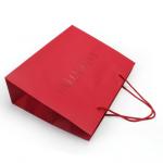 4C 6C Offset Printing Garment Paper Bags Dazzling Red Paper Gift Bags With Handles for sale
