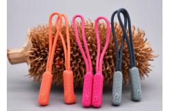 China 3D Embossed Plastic Zipper Puller With Polyester String For Garments supplier