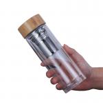 Customized Borosilicate Glass Bottle , Clear Glass Drinking Bottle With Bamboo Lid for sale