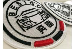 China Heat Cut Twill Fabric Custom Clothing Patches Cloth Embroidered Badges supplier