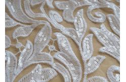China Scalloped Edge White Sequin Mesh Fabric For Party Gown Rich Leaves Design supplier