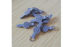 China ODM Metal Zipper Head 90 Shore A Silicone Zipper Puller supplier