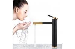China Waterfall Black Basin Faucet With Golden Handle Hot And Cold Mixer supplier