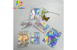 China Transparent Front Foil Packaging Bags Holographic Smell Proof Heat Seal Recyclable supplier