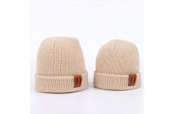 China Leather Patch Knit Beanie Hats Custom Design Warm Hat Cap Yellow Beanie Hats supplier