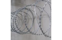 China Wholesale Hot Galvanized Razor Barbed Wire Roll Used With Chain Link Fence supplier