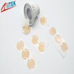 Motor Controllers Light Amber Customized 1.6W Phase Change Thermal Pad 0.102mm Thickness for sale