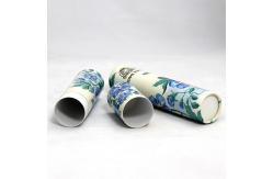 China Luxury Package Blue Flower Design Hot Paper Cans Packaging Inside With Plastic Jar supplier