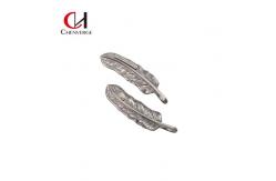 China Feather Shape Metal Garment Accessories Anti Erosion Bag Pendant supplier