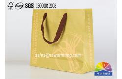 China Custom Recycle Brown Kraft Portable Paper Gift Bags With Screen Printing supplier