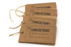 China Biodegradable CMYK 300gsm Kraft Paper Hang Tags For Jeans 50x90mm supplier