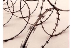 China CBT Concertina Razor Barbed Wire Coil Used In Prison Barriers / Detention Camps supplier