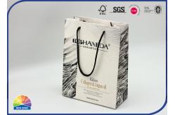 China Custom Paper Shopping Bags With Nylon Handle Matte Lamination supplier