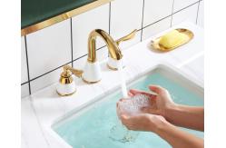 China Two Handle OEM Three Hole Retro Bathroom Sink Faucets supplier