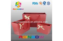China Unique Design White / Red Custom Printed Paper Bags With Handle supplier