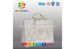 China Unique Design White / Red Custom Printed Paper Bags With Handle supplier