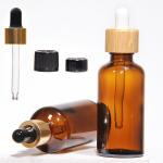 Customized Hot Stamping 2oz Glass Dropper Bottles With Plastic Lid for sale