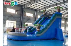 China Bouncy Slides Custom Backyard Palm Tree Themed Inflatable Water Slide With Splash Pool supplier