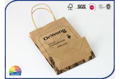 China Stand Up Packaging Kraft Paper Bags Black Printing With Handles supplier