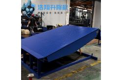 China 15T Blue Adjustable Height Hydraulic Truck Dock Leveler Loading Dock Lifts supplier