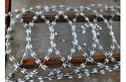 China Strong Defensive Galvanized Razor barbed wire Roll for Secure Boundaries supplier