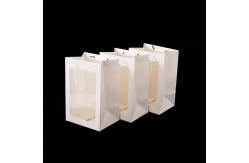 China Handmade Offset Printing Kraft Paper Gift Bags With Clear Window supplier