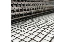 China Yarns Fiberglass Geogrid With Black And Green Color supplier